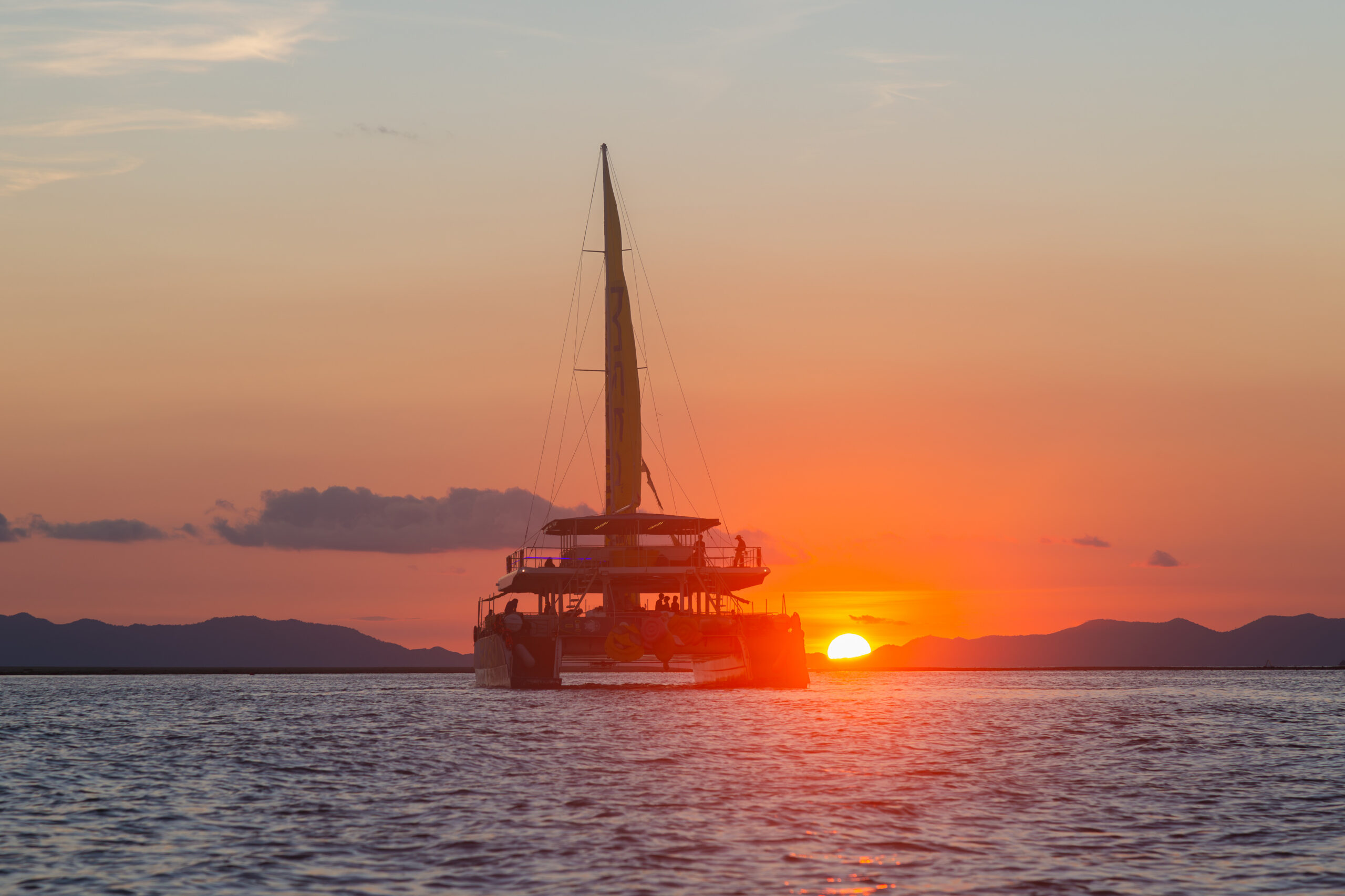 MEKA Catamaran with sunset