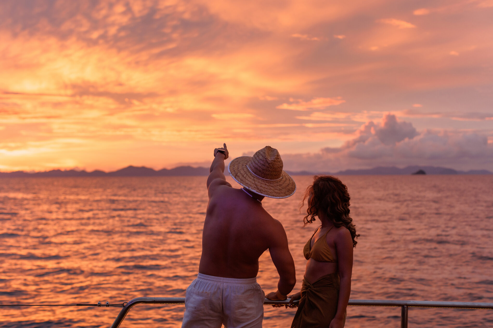 Couple enjoying sunset on Meka Catamaran – romantic Krabi cruise
